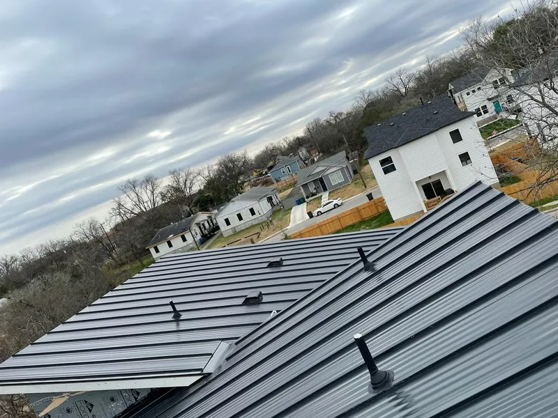 Standing seam metal roof panels with vents for Skylight Repair in Wooster